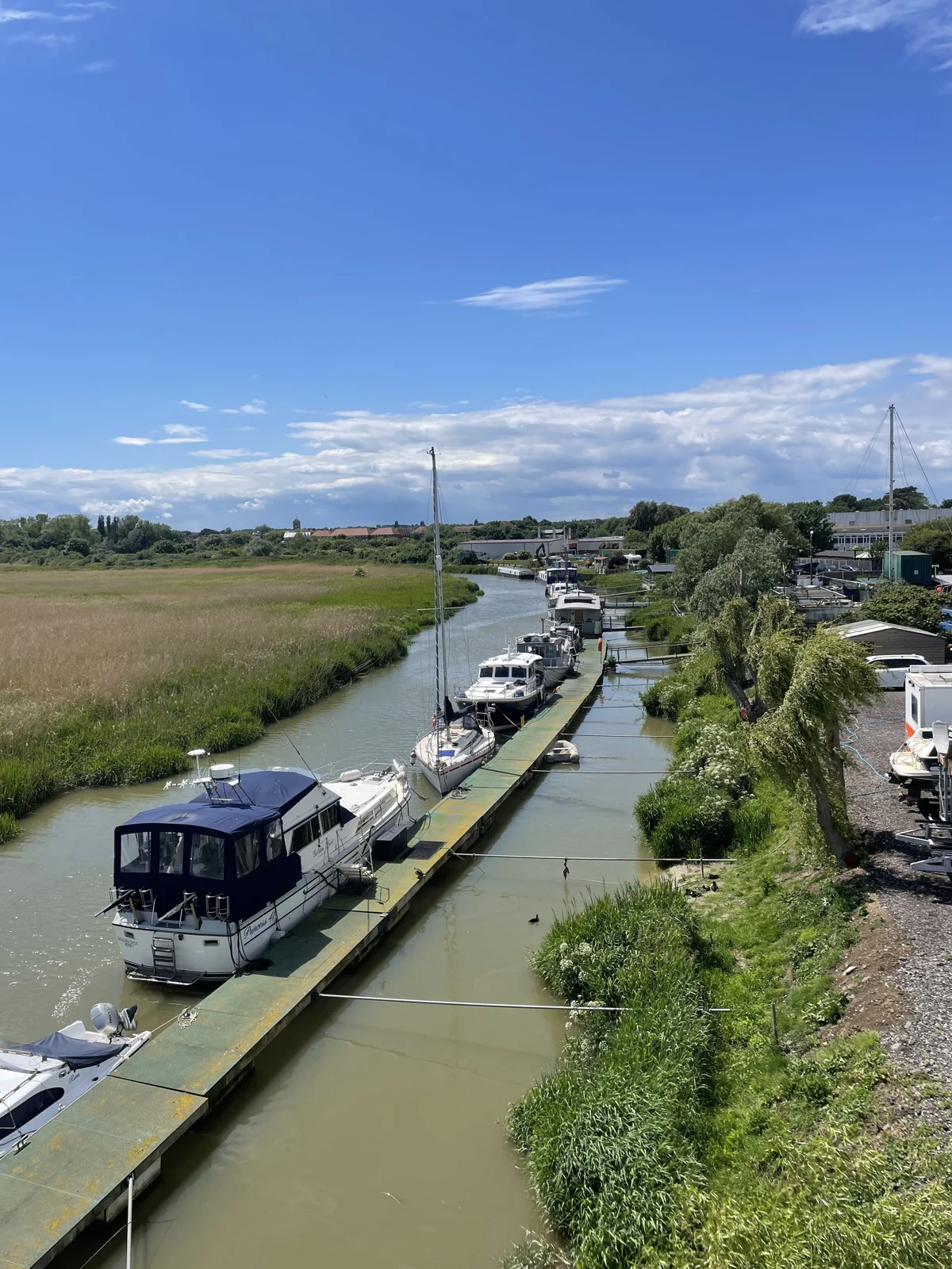 Boats moored along the River Stour at Sandwich Marina
